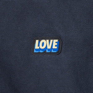 Kids Of Immigrants patch with love in blue and beige